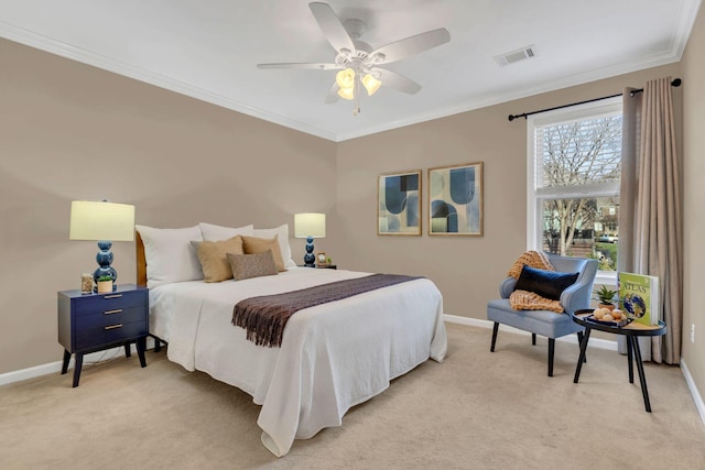 carpeted bedroom featuring ceiling fan and ornamental molding