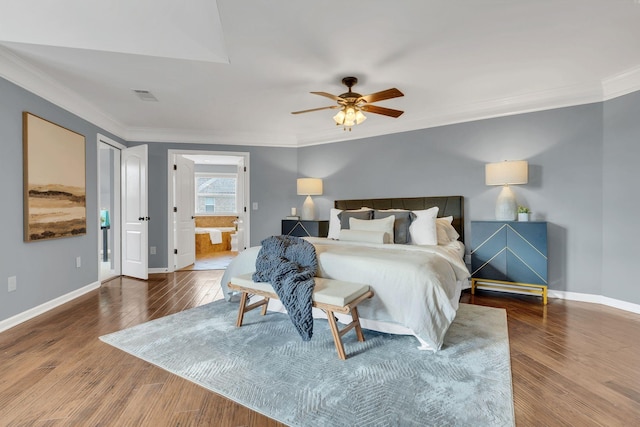 bedroom with ensuite bath, ceiling fan, ornamental molding, and hardwood / wood-style flooring