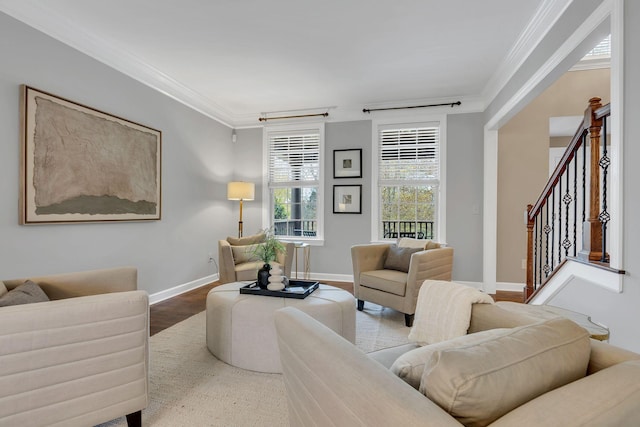 living room featuring hardwood / wood-style floors and crown molding