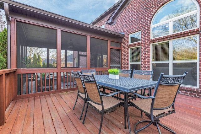 wooden terrace with a sunroom