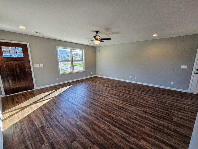 entryway featuring dark hardwood / wood-style floors, plenty of natural light, and ceiling fan