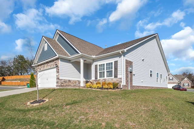 craftsman inspired home featuring a front lawn and a garage