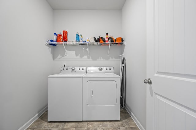 laundry room with washer and dryer