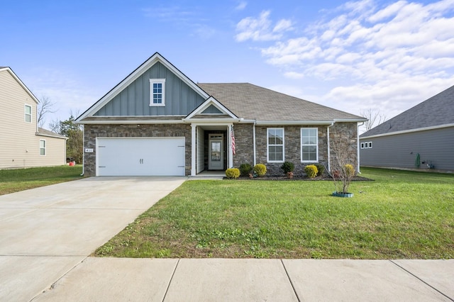 view of front of house featuring a garage and a front yard