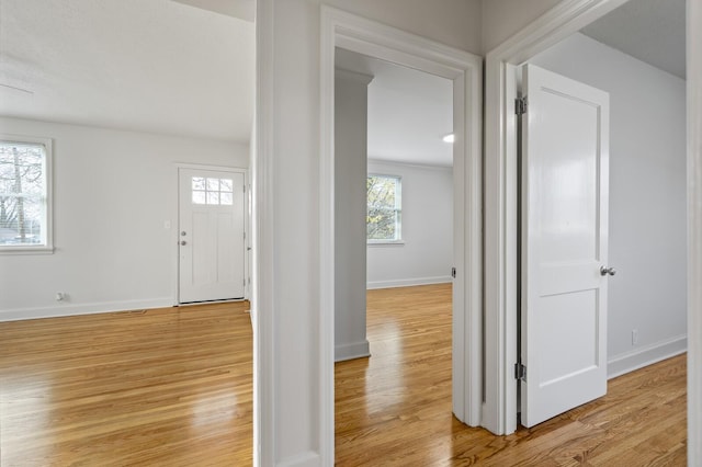 foyer entrance featuring light hardwood / wood-style flooring