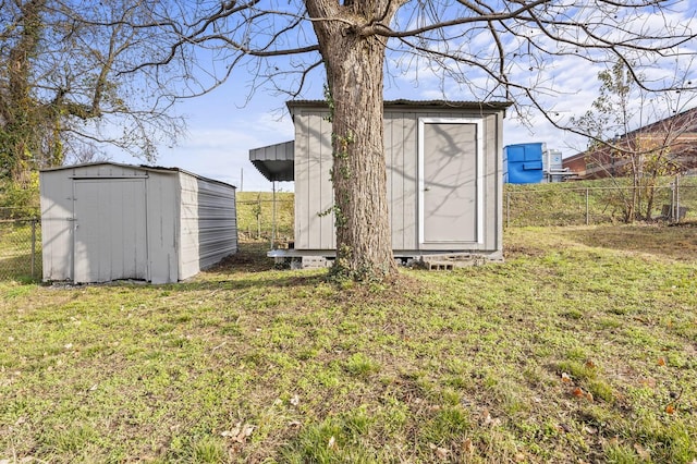 view of outbuilding featuring a yard