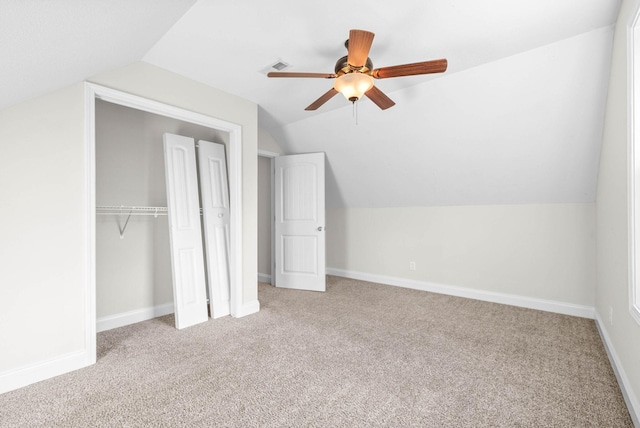 bonus room with light colored carpet, ceiling fan, and lofted ceiling