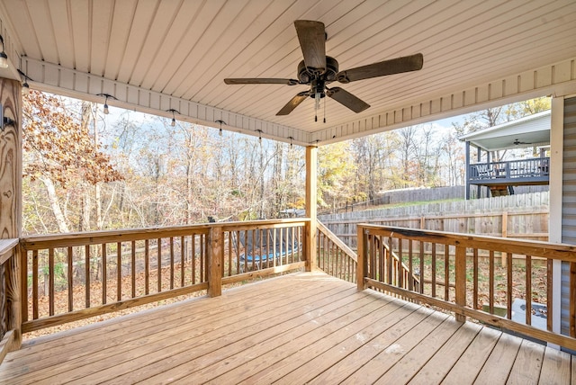 wooden deck with ceiling fan