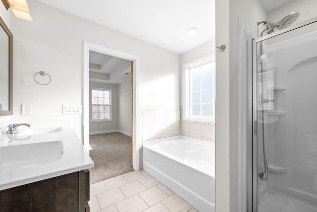 bathroom with vanity and independent shower and bath