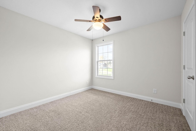 unfurnished room with carpet flooring and ceiling fan