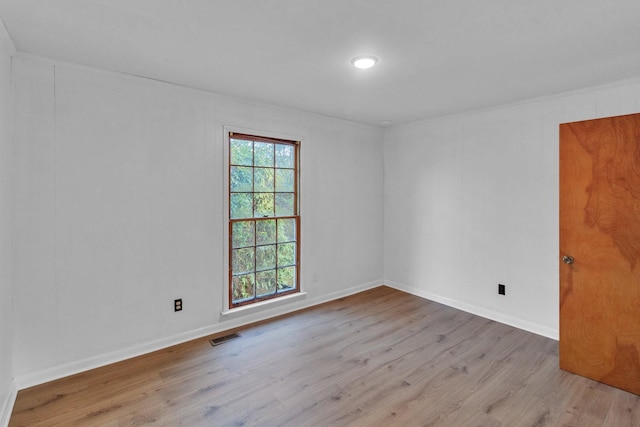 empty room with light wood-type flooring