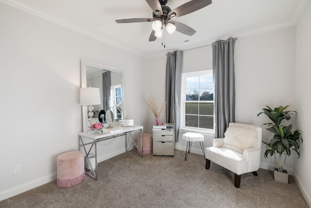 living area with carpet flooring, ceiling fan, and ornamental molding