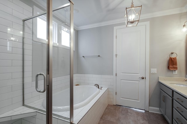 bathroom with vanity, ornamental molding, and independent shower and bath