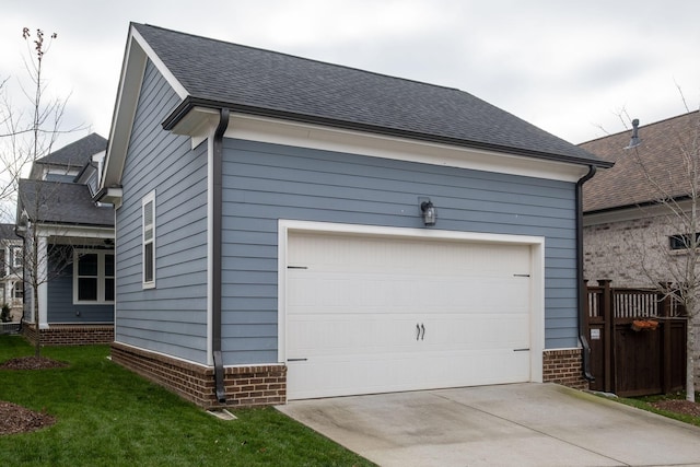 view of side of property featuring a garage