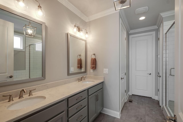 bathroom featuring tile patterned floors, a shower with door, vanity, and ornamental molding