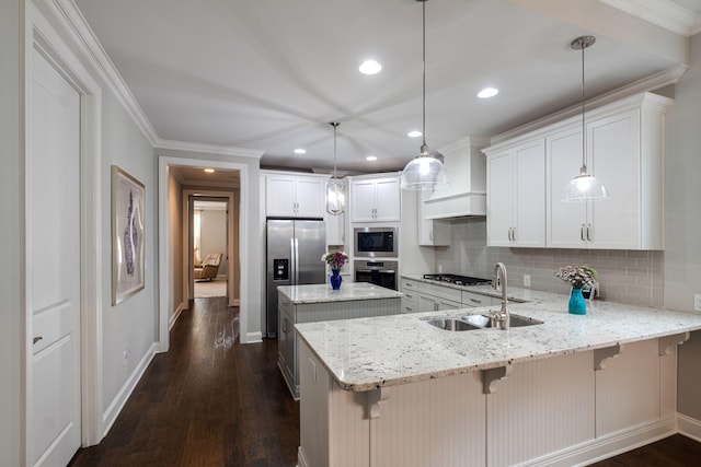 kitchen featuring kitchen peninsula, white cabinetry, sink, and appliances with stainless steel finishes