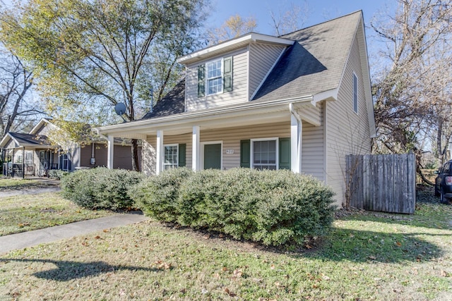 view of front of property with a front lawn