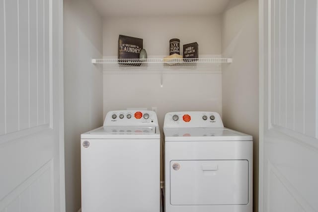 laundry area featuring washing machine and dryer