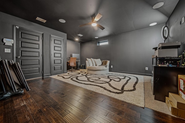 sitting room featuring hardwood / wood-style floors and ceiling fan