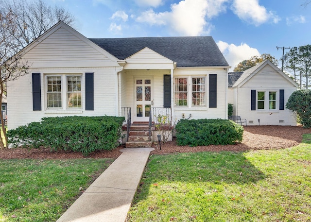 view of front of home with a front yard