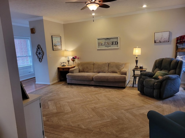 living room with ceiling fan, ornamental molding, and light parquet floors