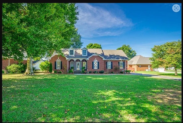 view of front of house with a front yard