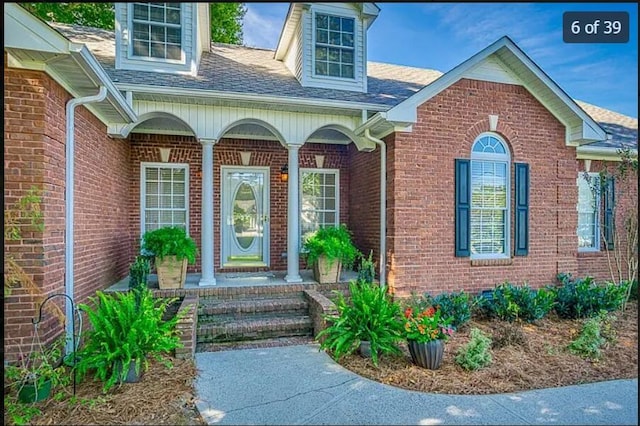 property entrance with covered porch