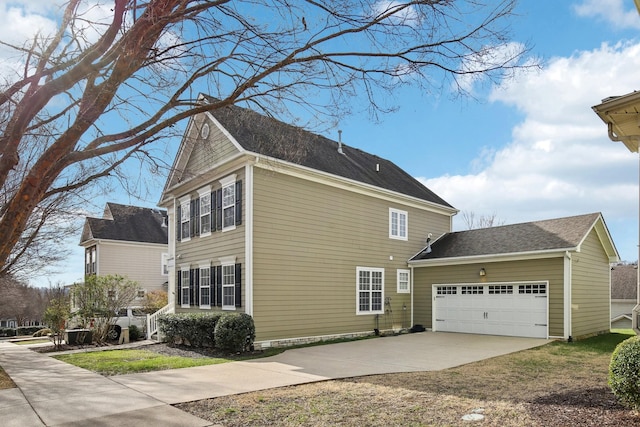 view of property exterior featuring a garage