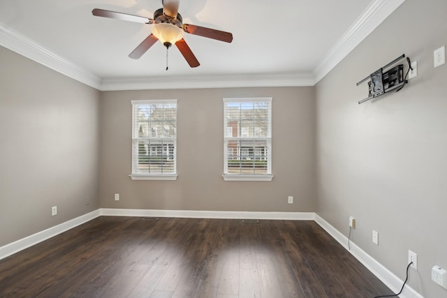 empty room with dark hardwood / wood-style floors, ceiling fan, and ornamental molding