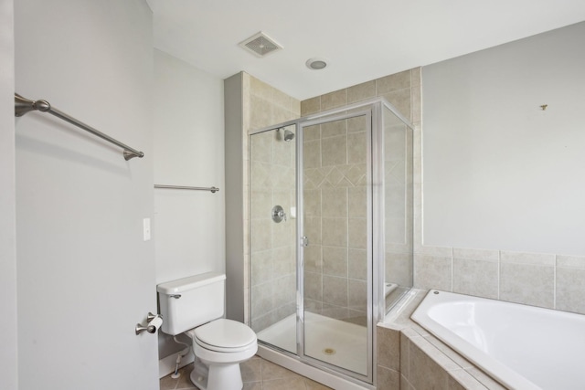 bathroom with tile patterned flooring, separate shower and tub, and toilet