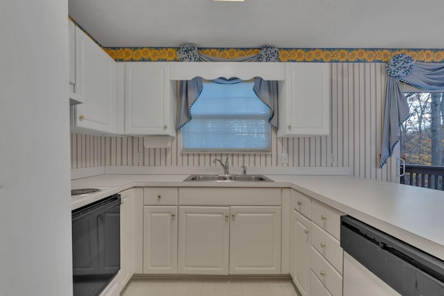 kitchen with dishwasher, white cabinets, range with electric stovetop, and sink