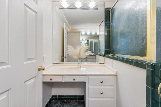 bathroom featuring vanity and ornamental molding