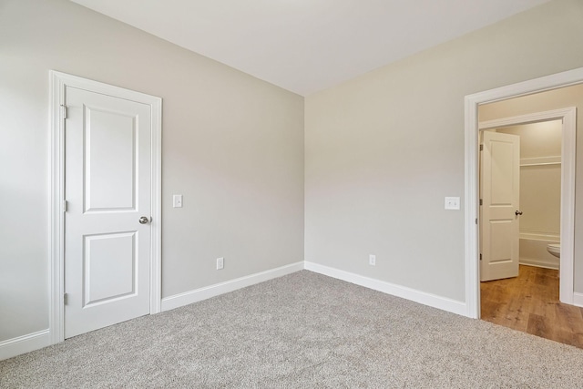 empty room with carpet floors