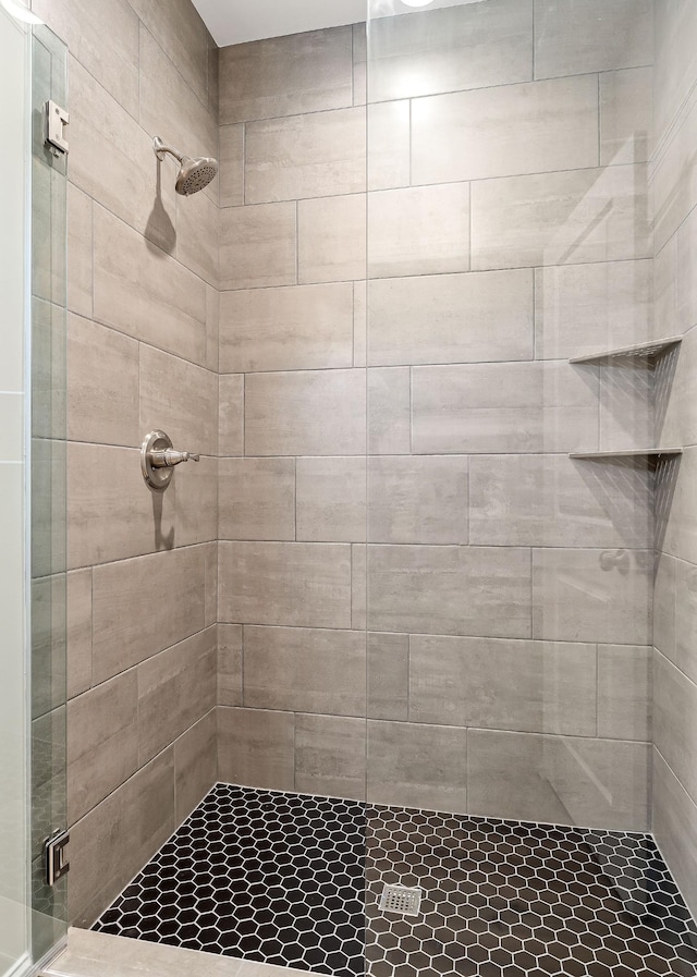 bathroom with an enclosed shower