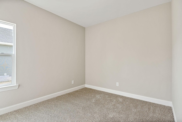 spare room with carpet flooring