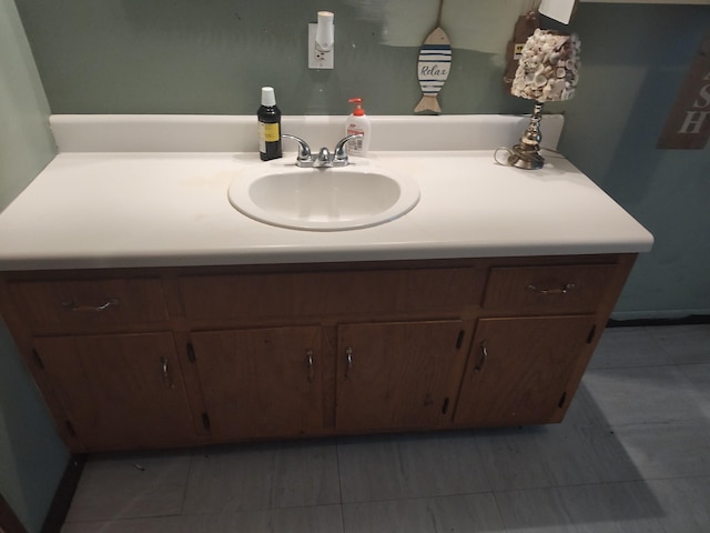 bathroom featuring tile patterned floors and vanity