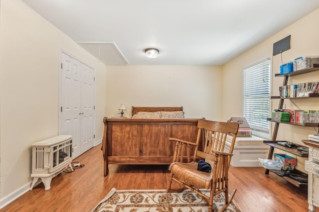 bedroom featuring a closet and light hardwood / wood-style floors