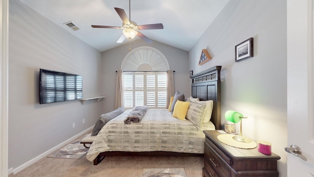 carpeted bedroom featuring ceiling fan and vaulted ceiling