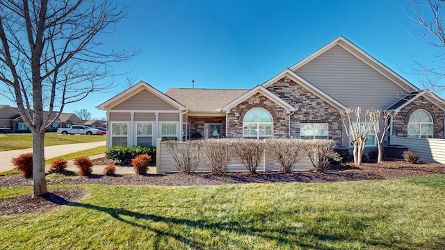 view of front of home with a front yard