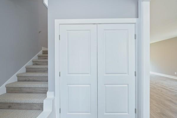 104A N St, Portland, TN 37148 - stairs featuring wood finished floors and baseboards