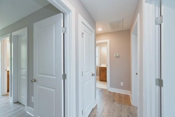 104A N St, Portland, TN 37148 - hallway featuring light wood finished floors and baseboards