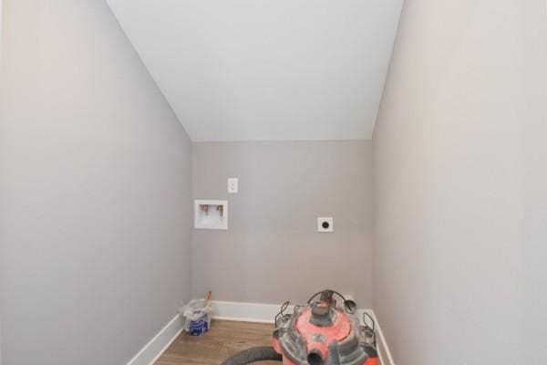 laundry room featuring hardwood / wood-style floors, hookup for a washing machine, and electric dryer hookup