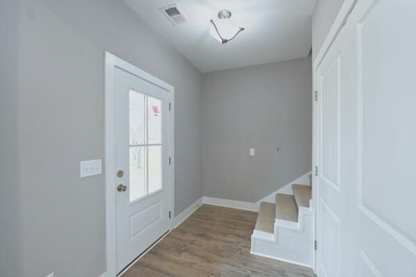 104A N St, Portland, TN 37148 - entryway with wood finished floors, stairs, and baseboards