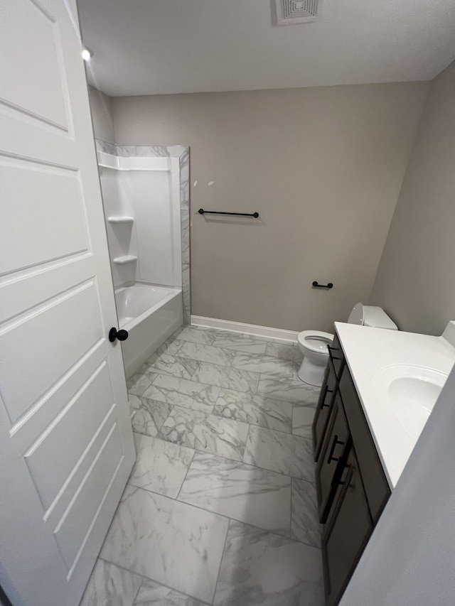 full bathroom featuring vanity, bathing tub / shower combination, and toilet