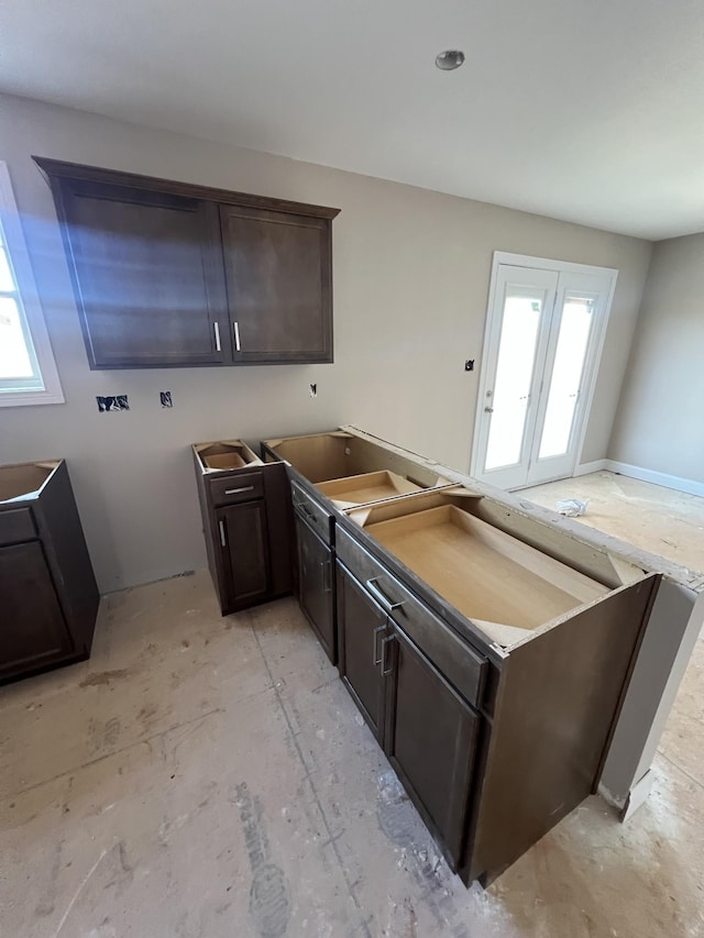 kitchen featuring dark brown cabinets