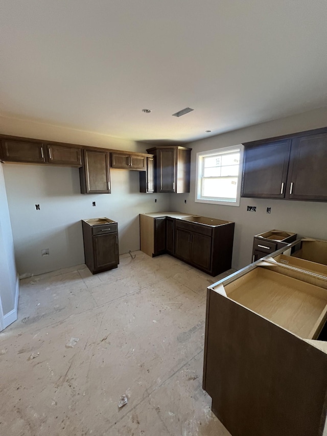 kitchen with dark brown cabinets