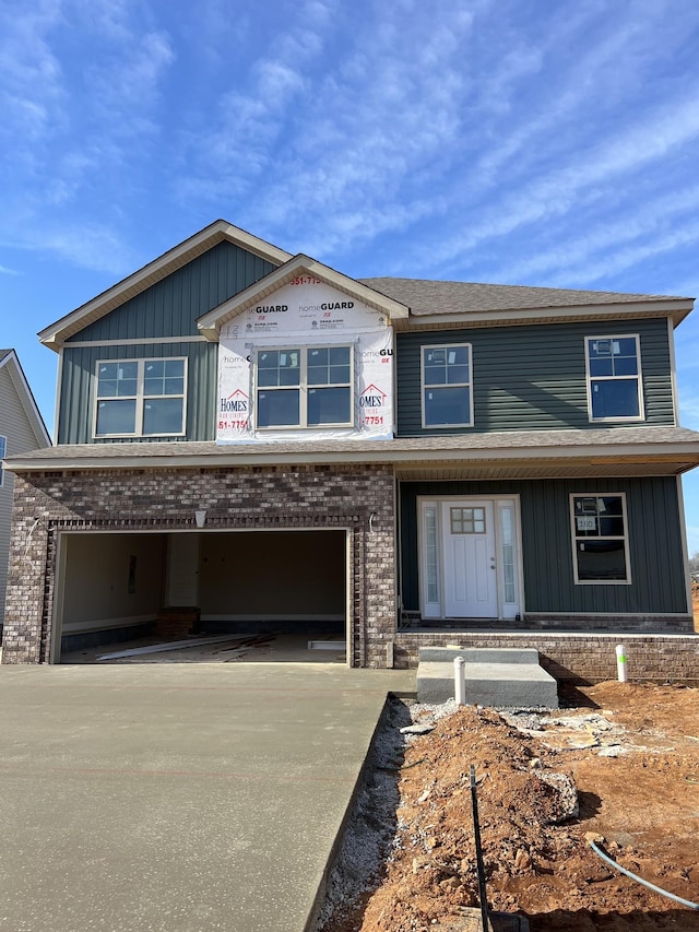 view of front of property featuring a garage