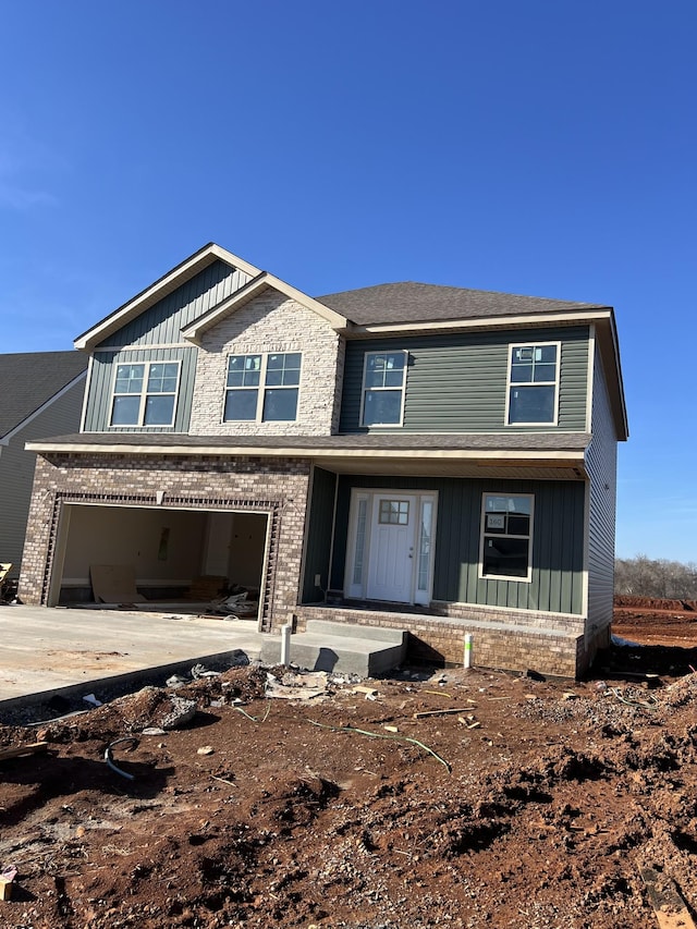 view of front of home with a garage