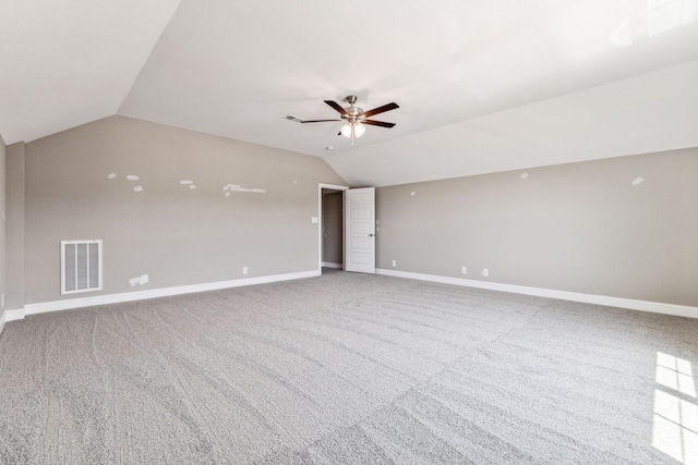 bonus room featuring baseboards, visible vents, lofted ceiling, ceiling fan, and carpet flooring