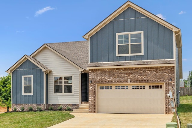 view of front of property with driveway, roof with shingles, board and batten siding, an attached garage, and crawl space